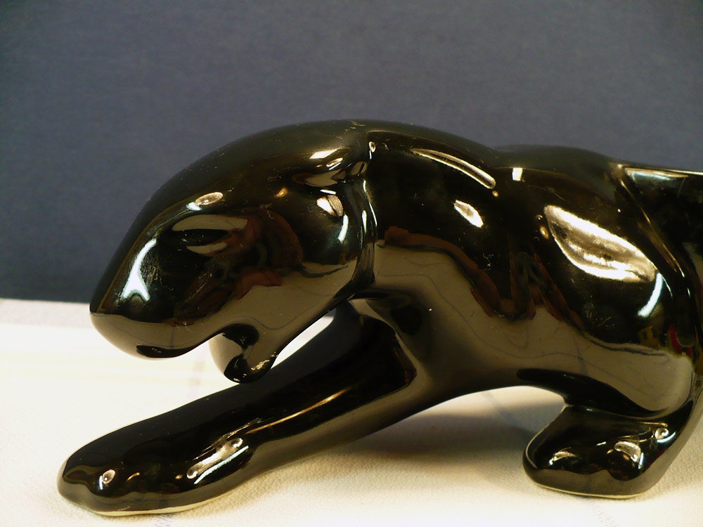 porcelain jaguar figurine