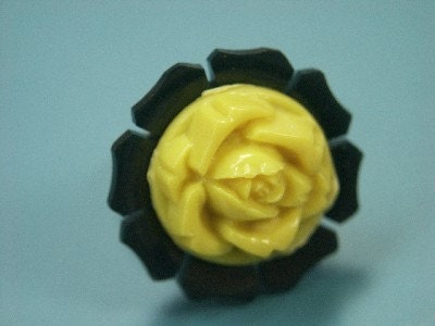 Adjustable handmade ring with vintage 1950s dark forest green and yellow plastic rose-decorated bead