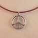 Peace Sign Necklace, Sterling Silver Peace Charm on a Crimson Leather Necklace