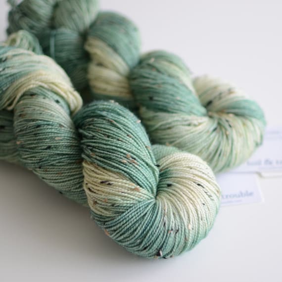 Hand Dyed Tweed Sock Yarn - Superwash Merino / Nylon 438 Yards - Ent - Pine Green and Cream