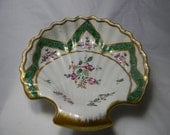 Vintage trinket dish, shell shaped with floral design and gold trim -