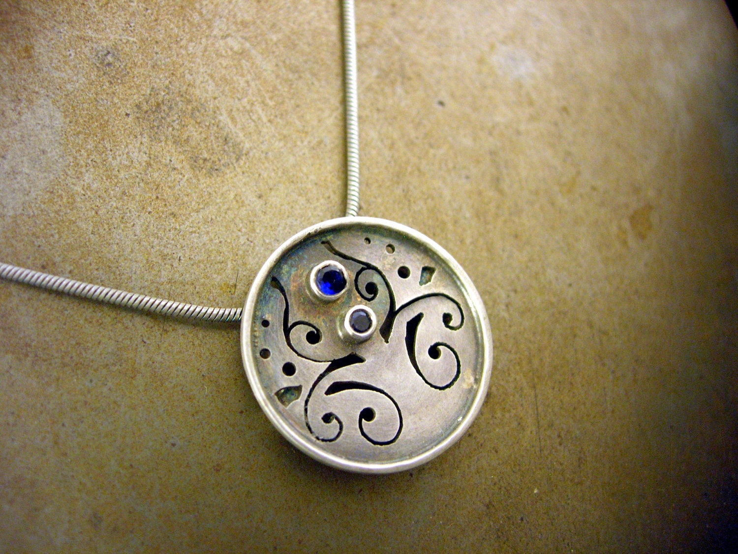 small circle necklace 1 with blue lab sapphires