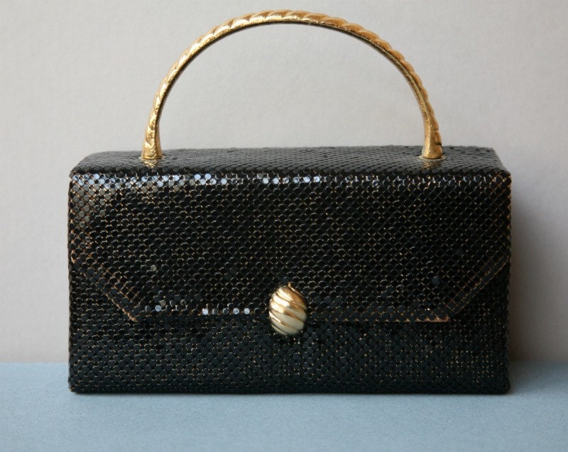 Small Black Mesh Evening Bag with Gold Toned Handle and Clasp