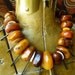 Over the Top Tribal Abundance golden honey resin, Naga shell