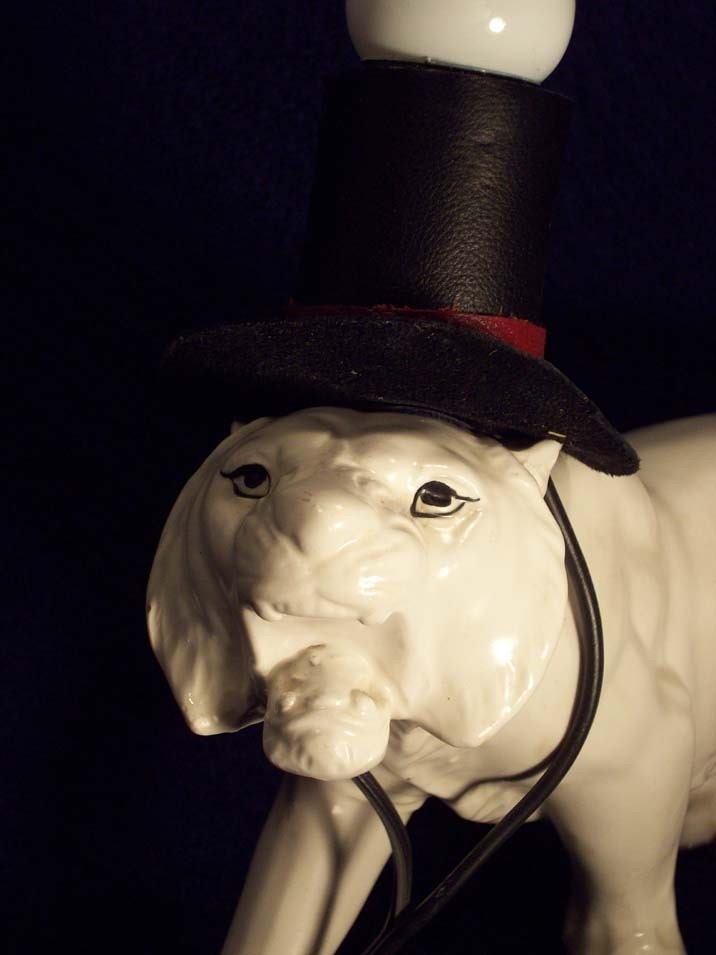 White Lion in Hat Lamp Light