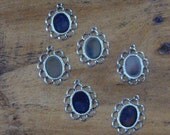 FREE DOMESTIC SHIPPING 25 Pack Wholesale Pack of Silver Plated Scalloped Edge 10X8mm Cabochon Glue On Style Settings