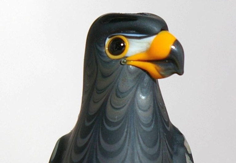 Black Hawk Lampwork glass bead wearable sculpture by Cleo Dunsmore - Grama Tortoise