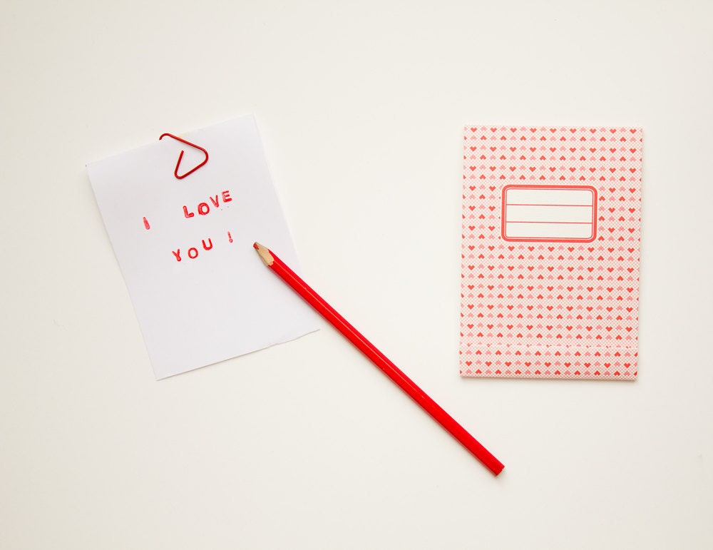 Notepad for Valentine day, with a red heart pattern
