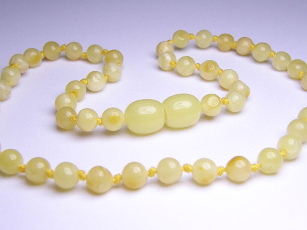 Royal white/milky Baltic amber teething necklace, round beads.