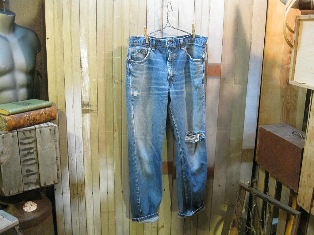 Vintage 505 Levis Blue denim jeans Fade Holes Made in USA 34 32