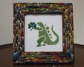 Godzilla with a Shamrock - Framed Cross Stitch