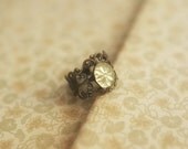 Adjustable antiqued brass ring with pale yellow vintage cut glass cabochon - Evening Star