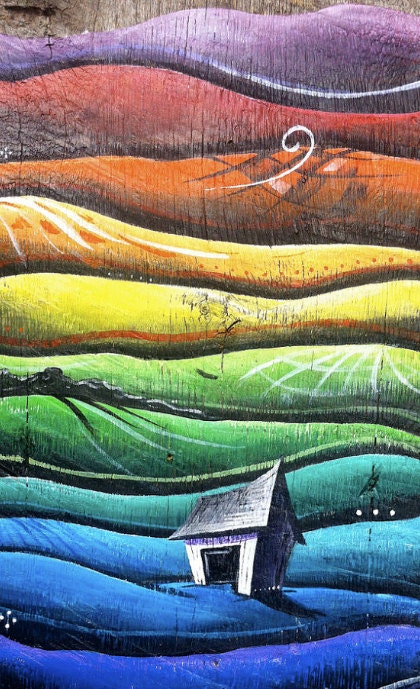 A Small 5x10 print of a barn on rolling hills with a colorful rainbow gradient