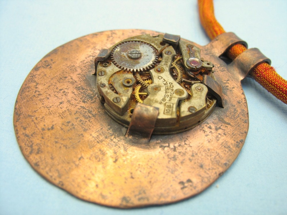 An Ancient Medallion: hammered steampunk pendant