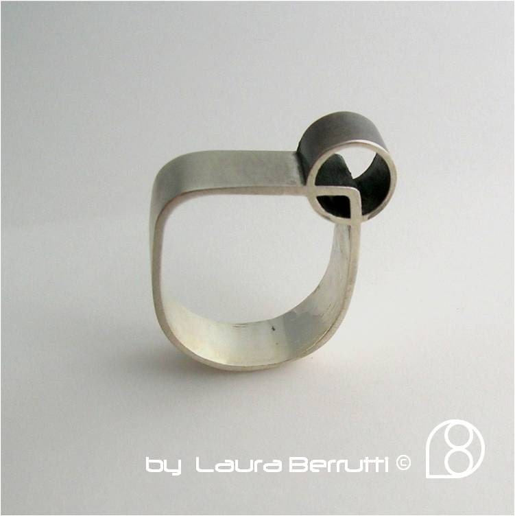 Sterling Silver Ring w/Tube Crossing Through