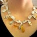 Sterling silver and Amber beads necklace, hammered leaves and beads