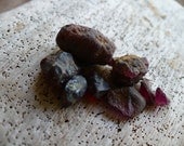 GEM MINING...my sons mountain crystal finds, a set of raw garnets