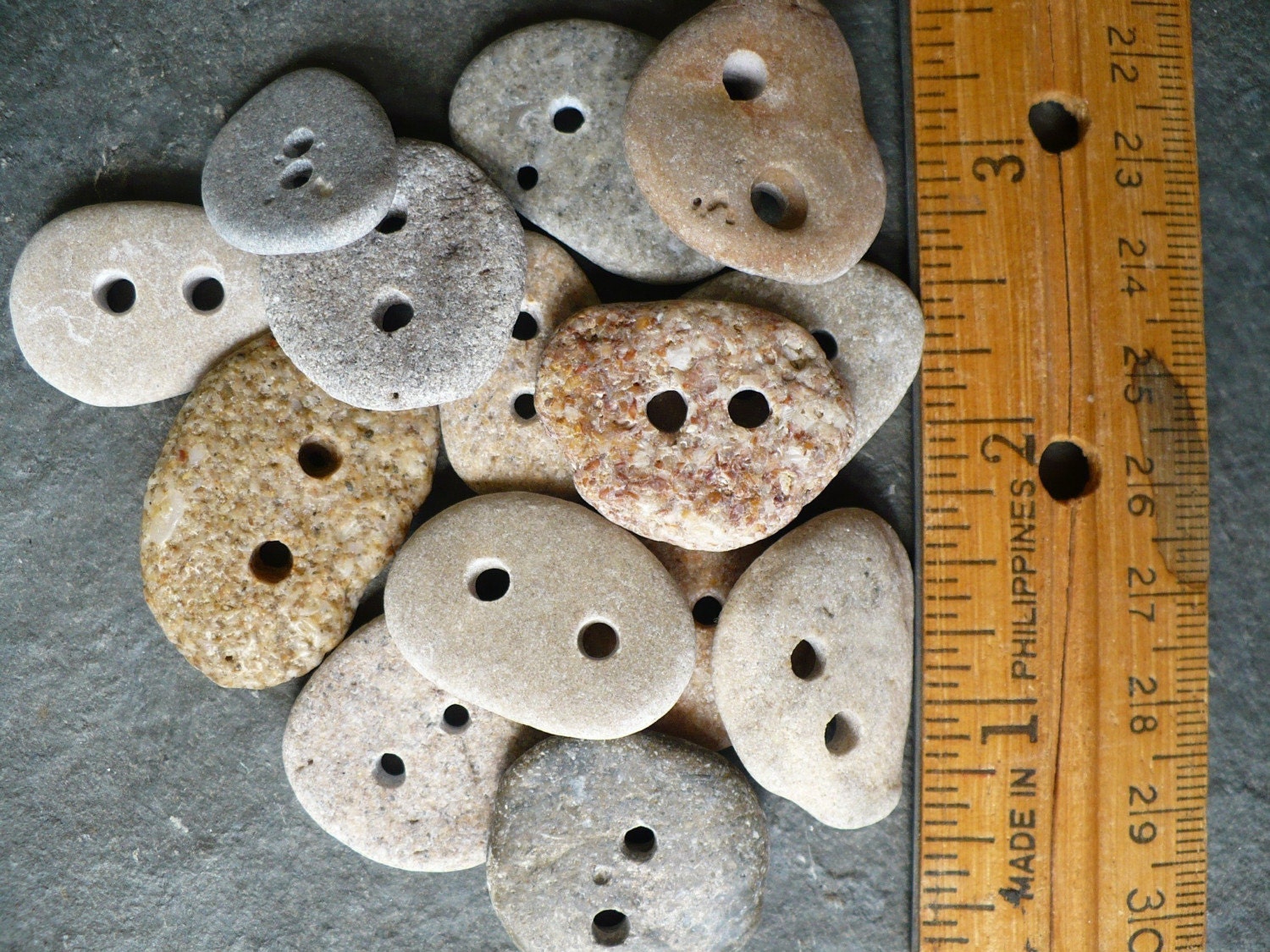 5 BEACH STONE BUTTONS...5 sweet hand drilled beach stones