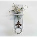 White Fleur de Lis towel hanger shelf flower vase shelf