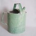 cool vintage green watering can