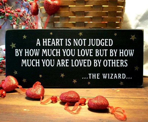 A Heart is not Judged Wizard Of Oz Painted Wood Sign Primitive