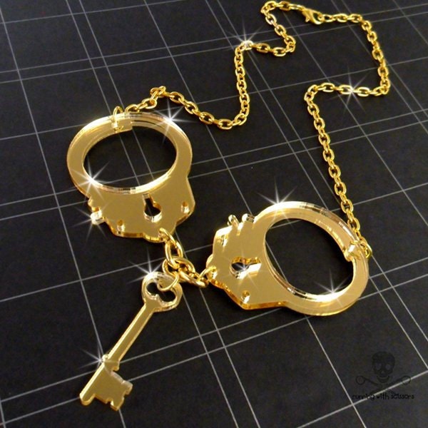 GOLD HANDCUFFS Laser Cut Acrylic Necklace by runningwithscissorss