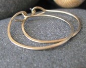 14k Gold Hammered Hoop Earrings. 1 1/4 inches wide