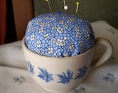 antique teacup pincushion with vintage fabric