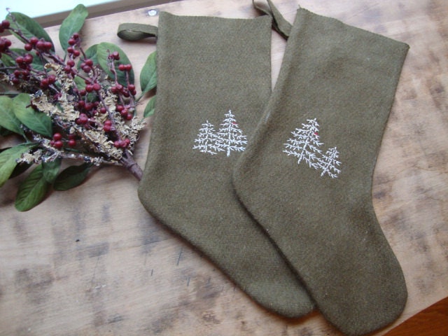 pair of wool army blanket Christmas stockings with embroidered trees