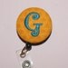 Many fabrics to design YOUR Badge Reel. Monogrammed single letter