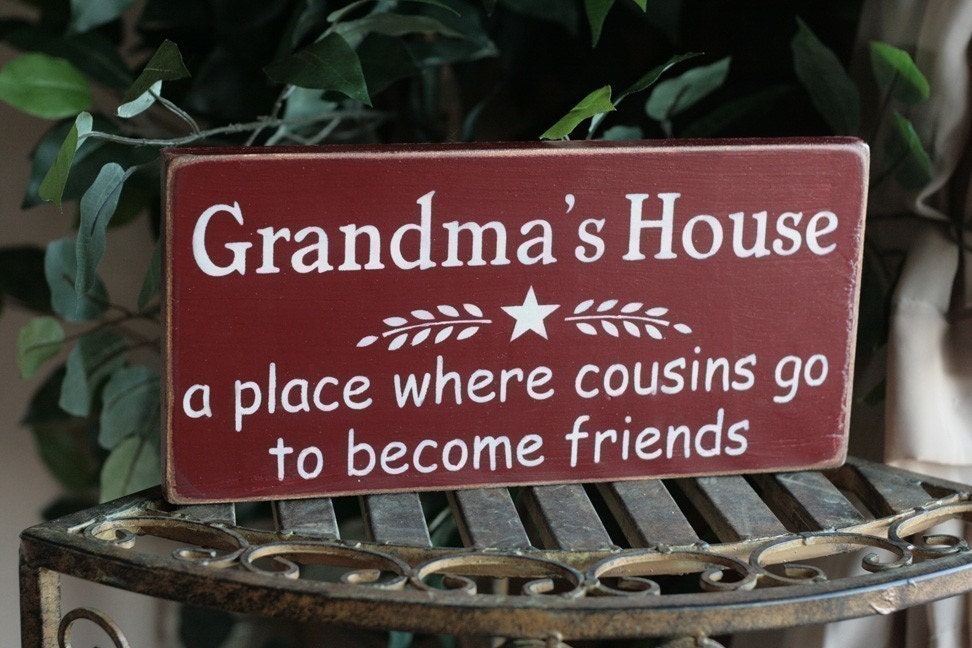 Grandmas house a place where cousins go to become friends PRIMITIVE wood sign
