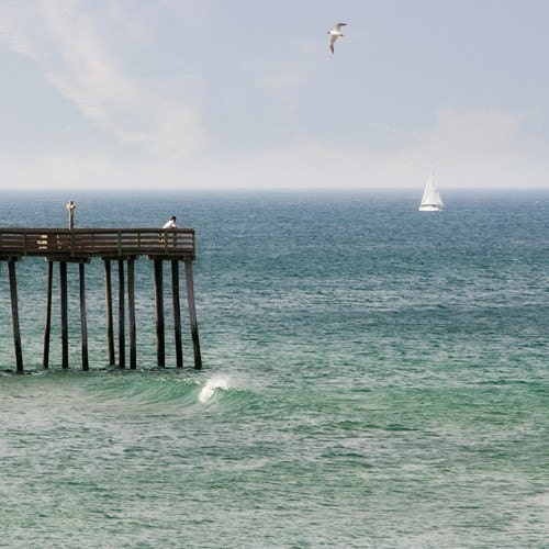 ocean fishing pier sailboat seagull white clouds blue green teal gentle waves 8x8 photo - Sailing Away