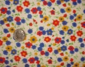 Red blue and yellow ditsy flowers on 100% cotton rib knit fabric 1 YD