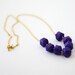 purple beaded necklace