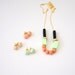 peach geo earrings