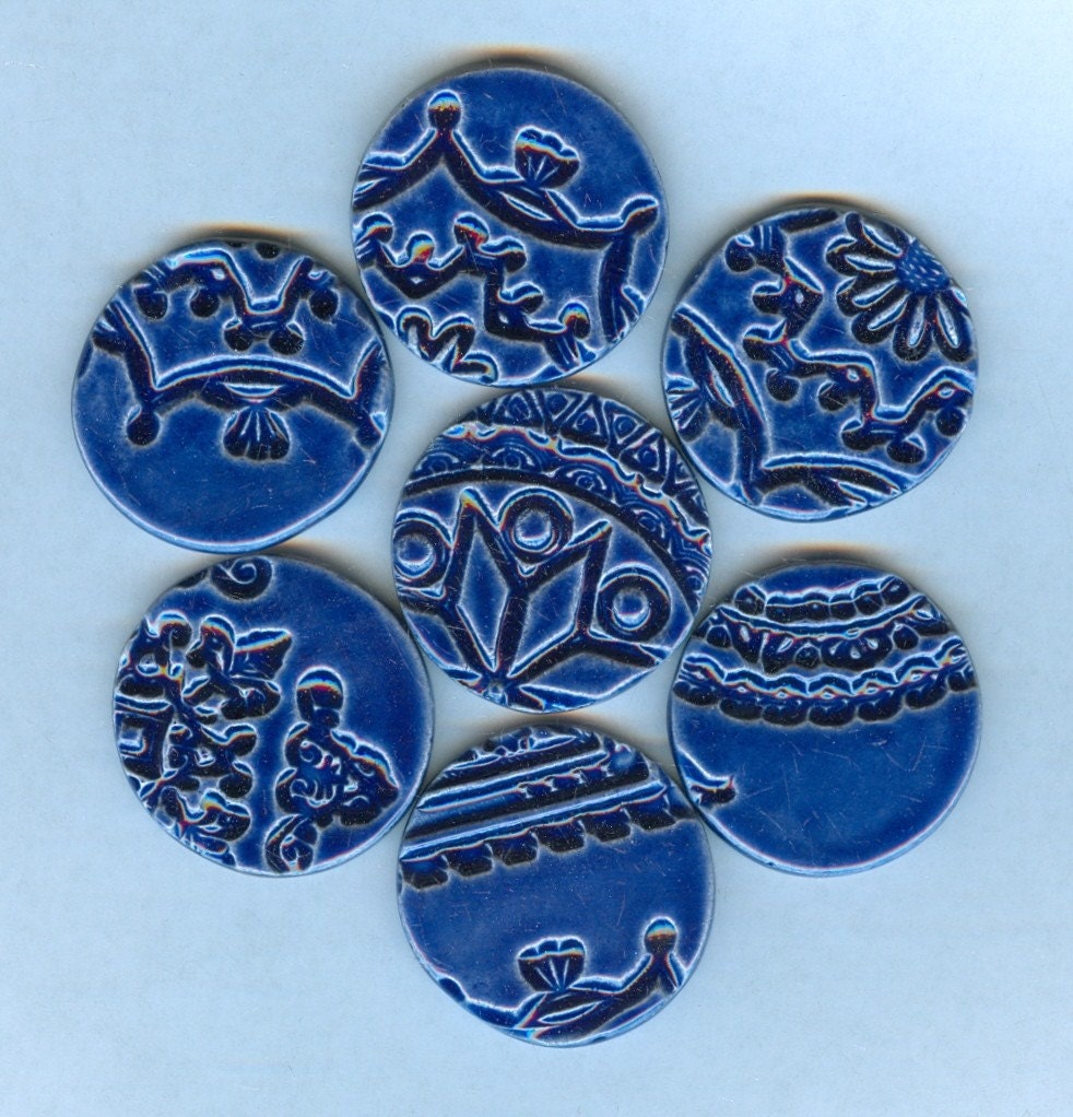 7 handmade round embossed ceramic tiles with by firedandfused