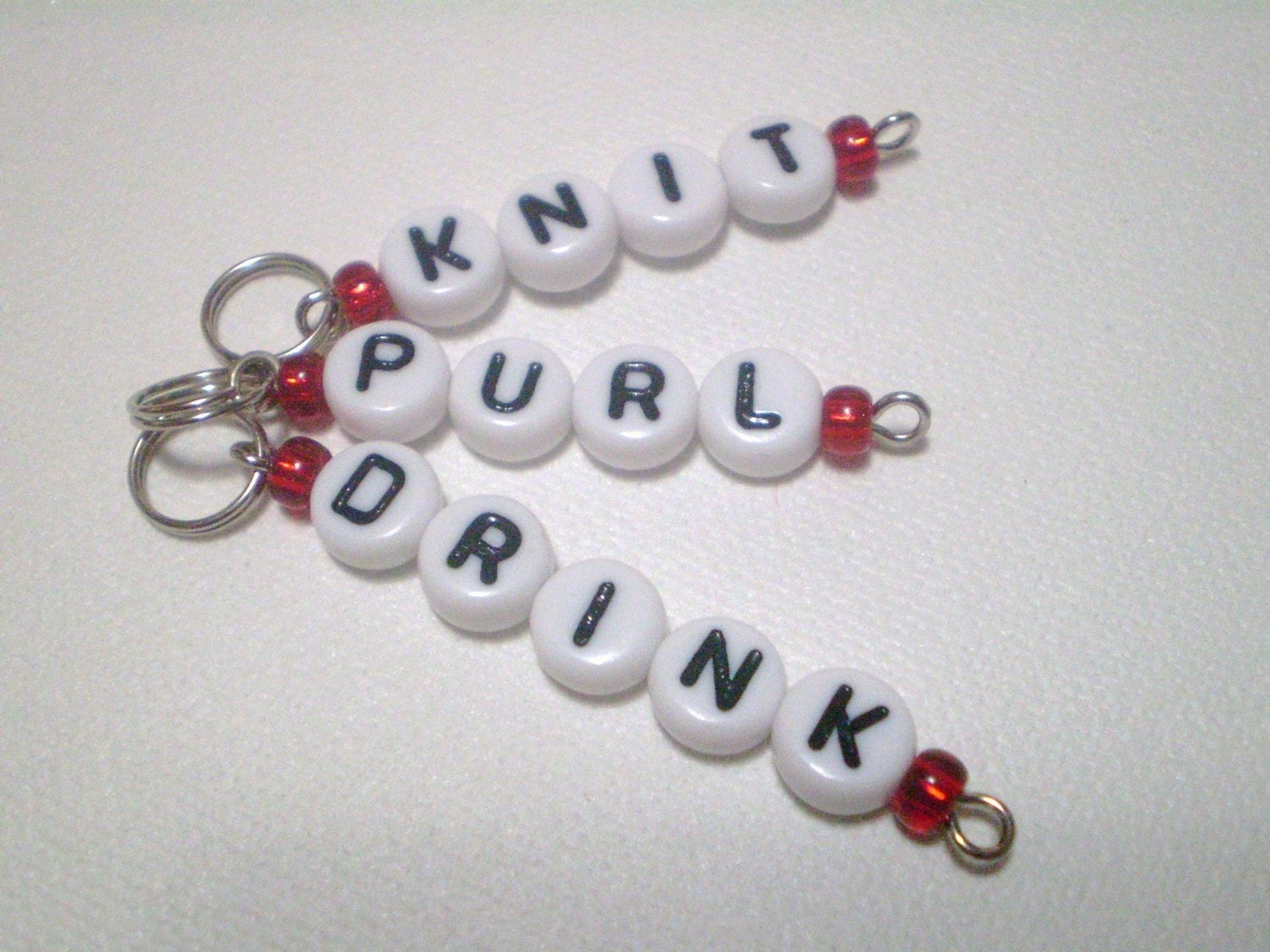 Knit, Purl, Drink Stitch Markers in Clear Red Sparkle lots of colors and options