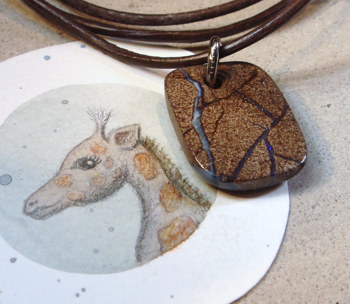 Natural boulder opal pendant, with leather to hang