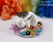 Butterfly Baby smelling a flower - ready to ship
