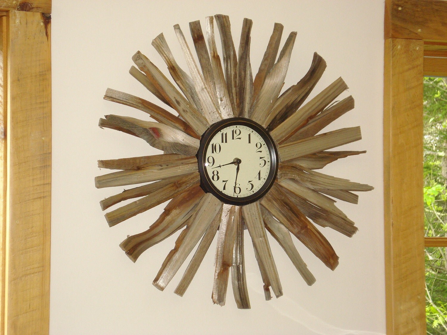 Driffwood ahşap tasarımlı duvar saatleri                       Tasarımcı : Duff Powell