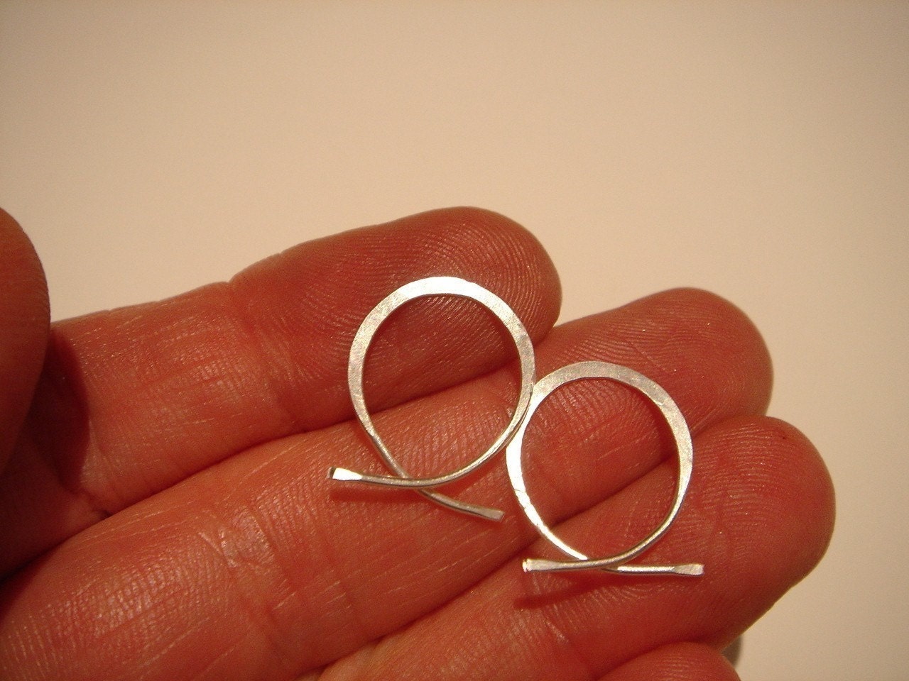 sterling silver..1\/2 inch...FISHTAIL...hoop earrings..