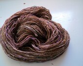 summer people: emma goldman ) silk and plant fiber hand dyed, handspun sport wieght yarn ( wool free with orange, pink, sparkle & yak