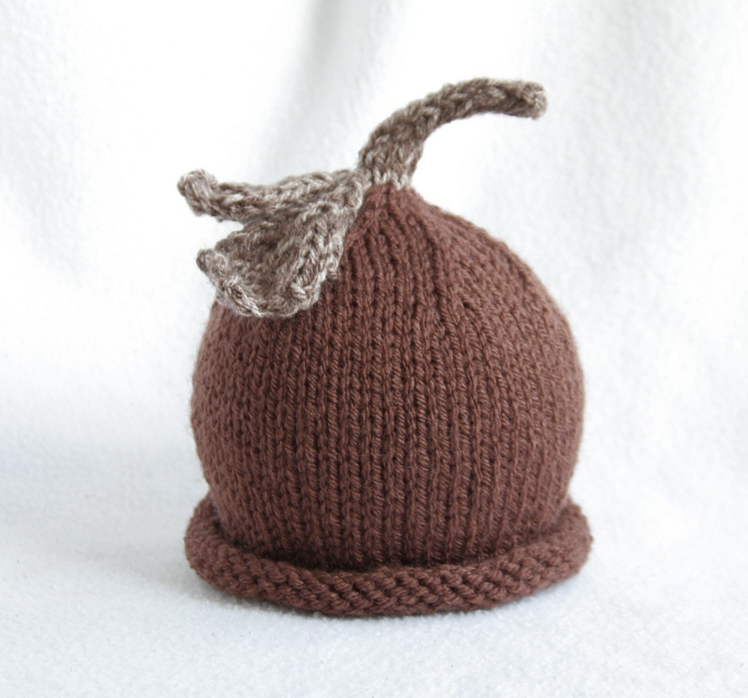 baby boy or girl knit hat with stem and leaves embellishment.  sizes newborn to big kid available.