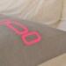 Grey lumbar linen pillow cover with retro neon design