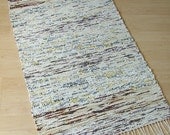 SPECKLED EGGS -- Hand-woven white and multicolored rug with speckled look