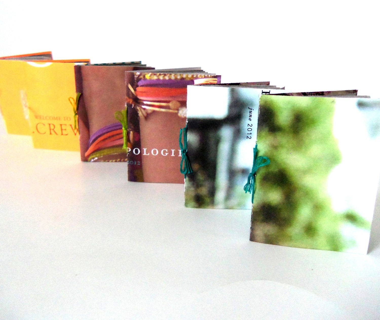 upcycled miniature journal - tiny blank recycled handmade paper booklets with upcycled magazine/catalog covers - set of 2