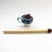 teacup of miniature escheverias in 12th scale