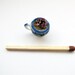 teacup of miniature escheverias in 12th scale