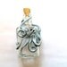 Miniature Upcycled Corked Glass Jar With Hand Sculpted Clay Octopus Wrap in Silver Gray And Light Blue Swirl