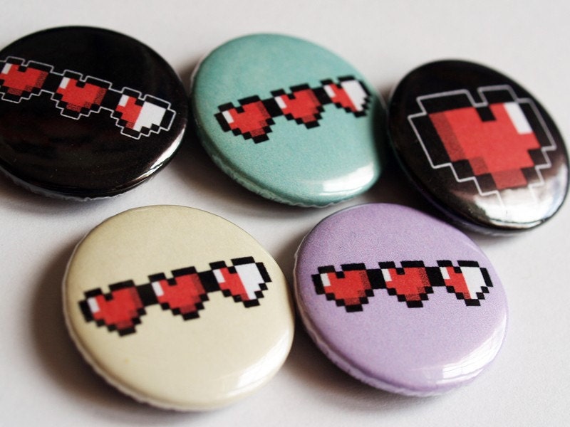 Set of 5 pixel heart buttons.
